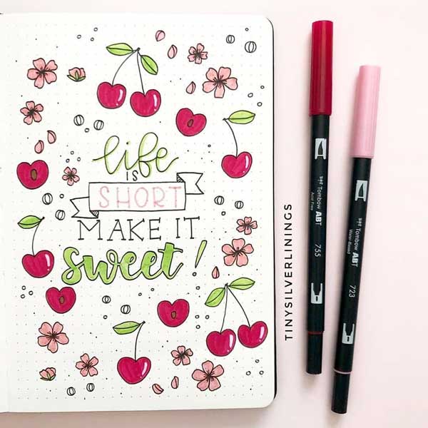 Bujo quotes page with cute doodles
